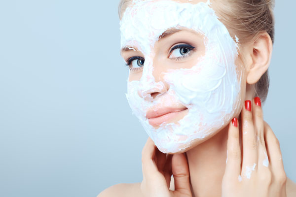 Woman with clay face mask