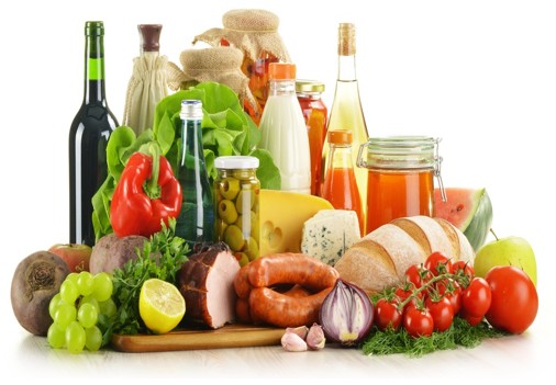 Assorted foods, including deli meats, oils, vegetables, and bread