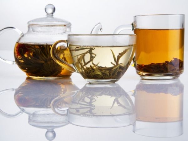 Assorted tea in teapot and cups