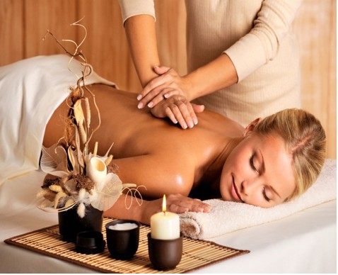 Woman enjoying spa massage