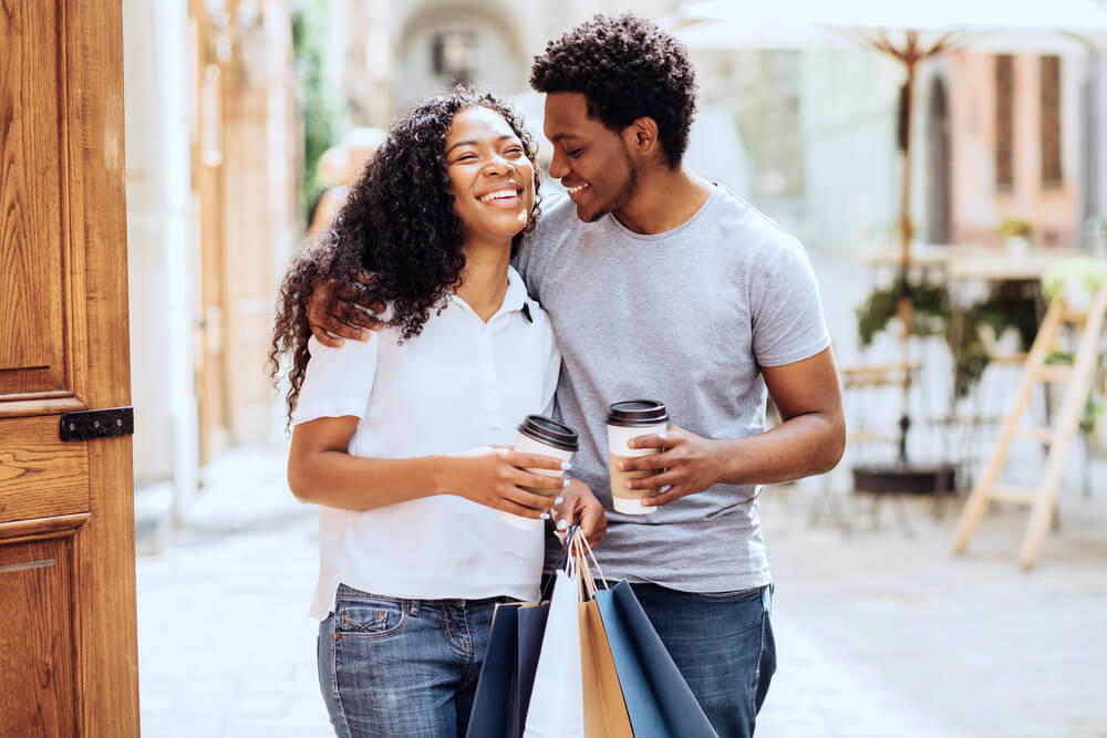 Happy couple taking a stroll outside