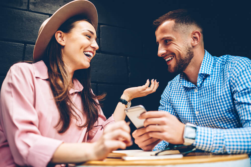 Couple laughing and having fun during a date