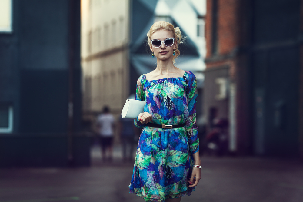 Stylish woman holding a purse