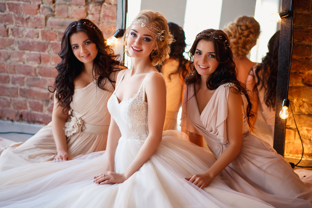 Bride with her bridesmaid.s