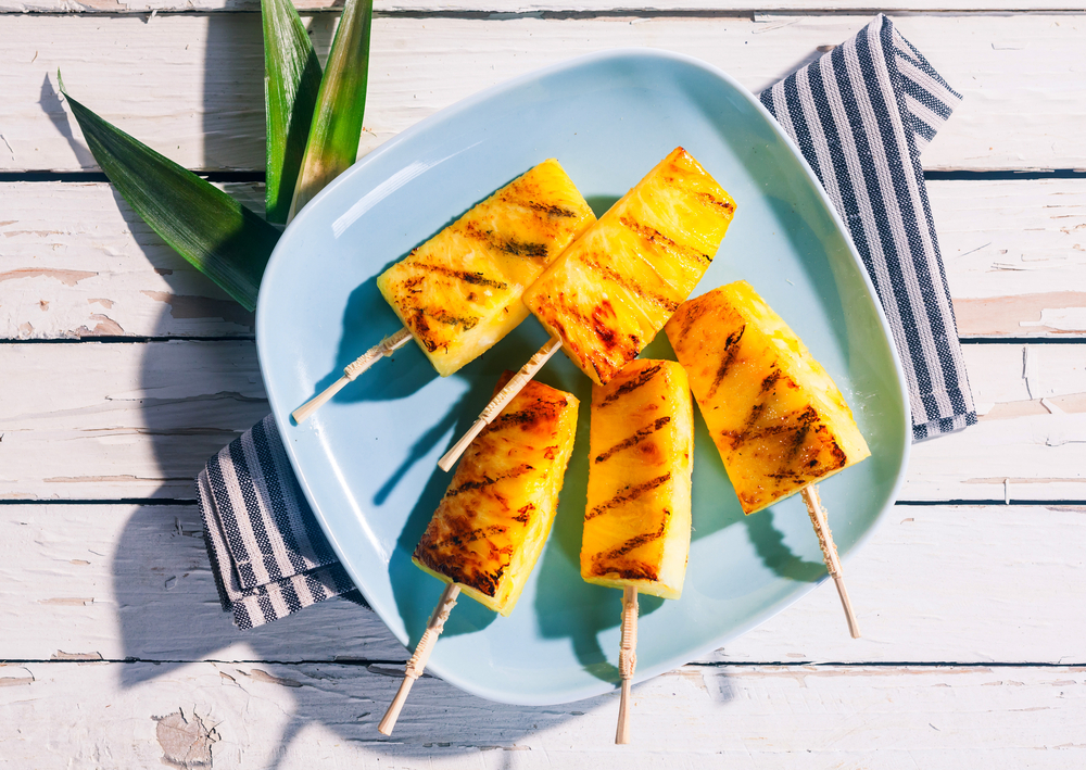 Grilled pineapples on a plate