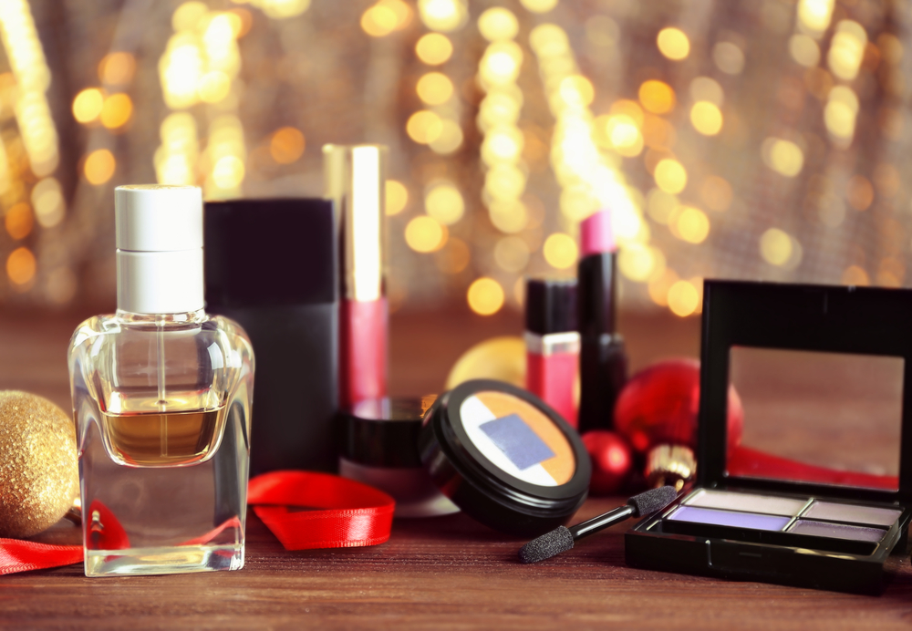 Makeup products against holiday lights