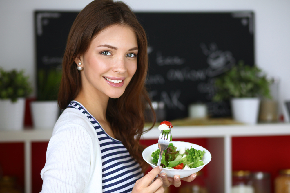 Woman eating healthy food