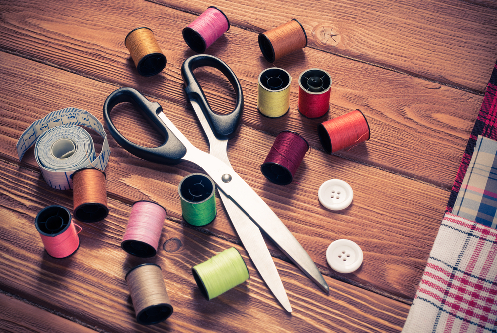 Sewing kit on wooden table