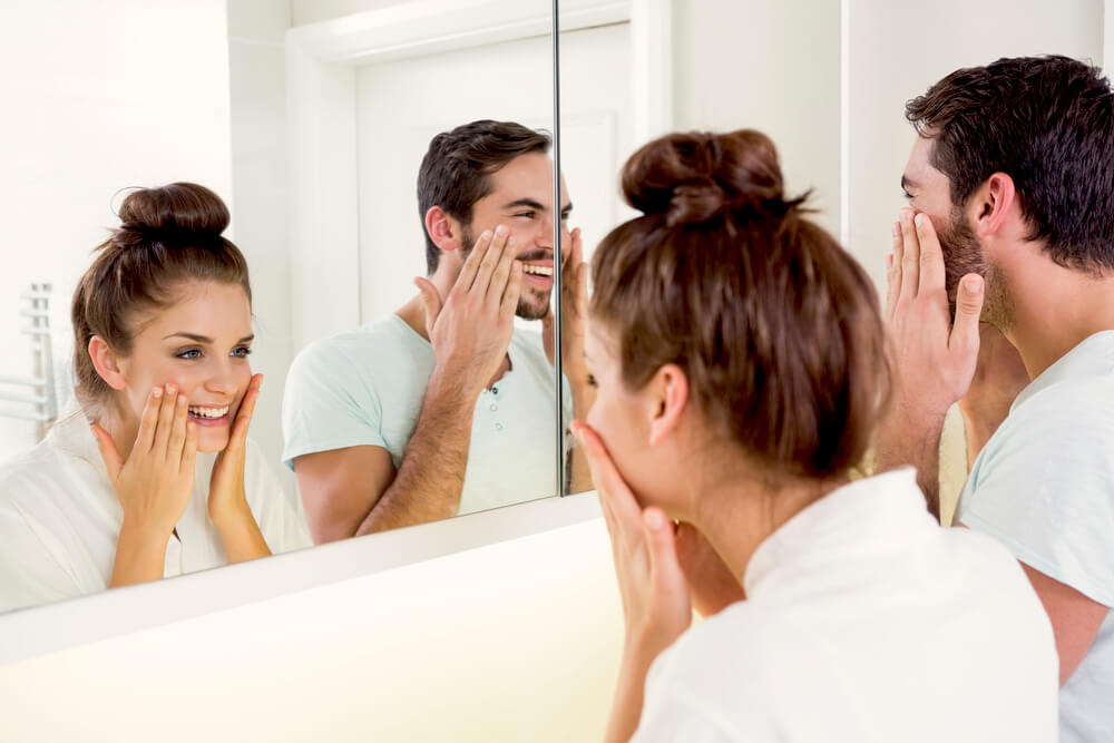 Couple in front of the mirror