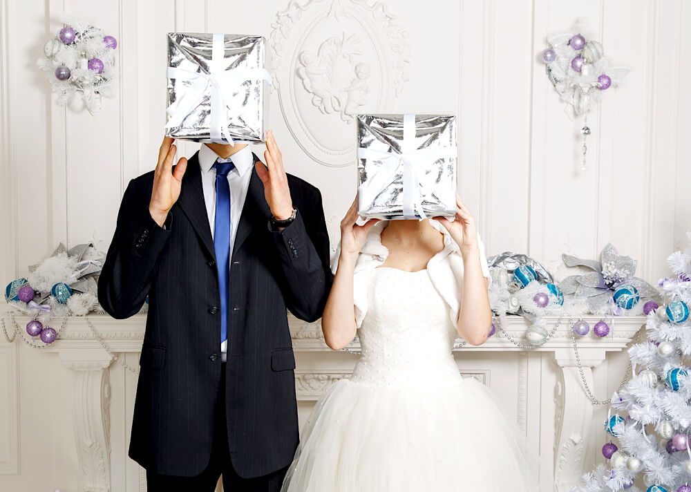 Wedding couple with silver gifts