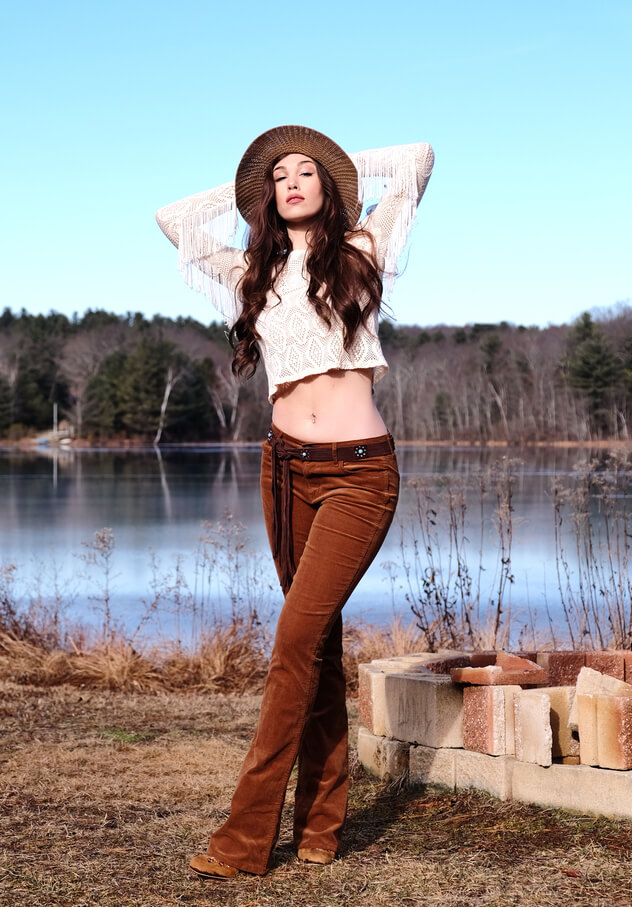 woman outdoors next to a lake