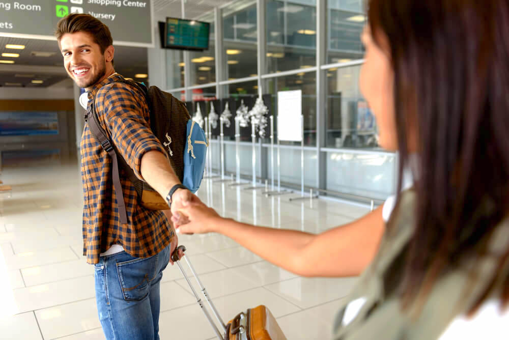 Couple parting at the airport