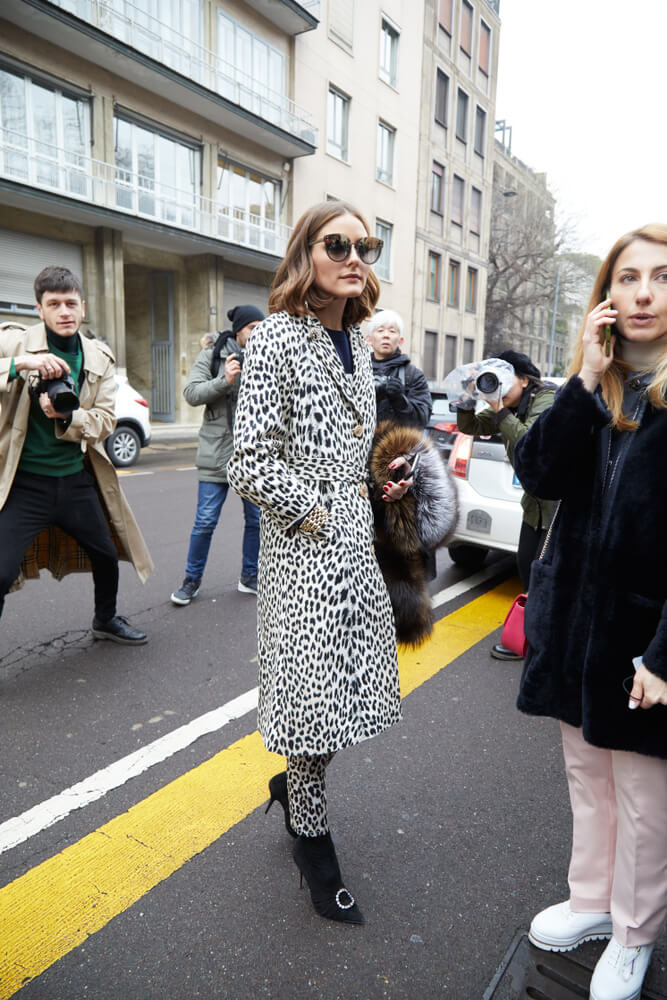 MILAN - FEBRUARY 22: Olivia Palermo with black and white spotted coat and sunglasses before Max Mara fashion show, Milan Fashion Week street style on February 22, 2018 in Milan.