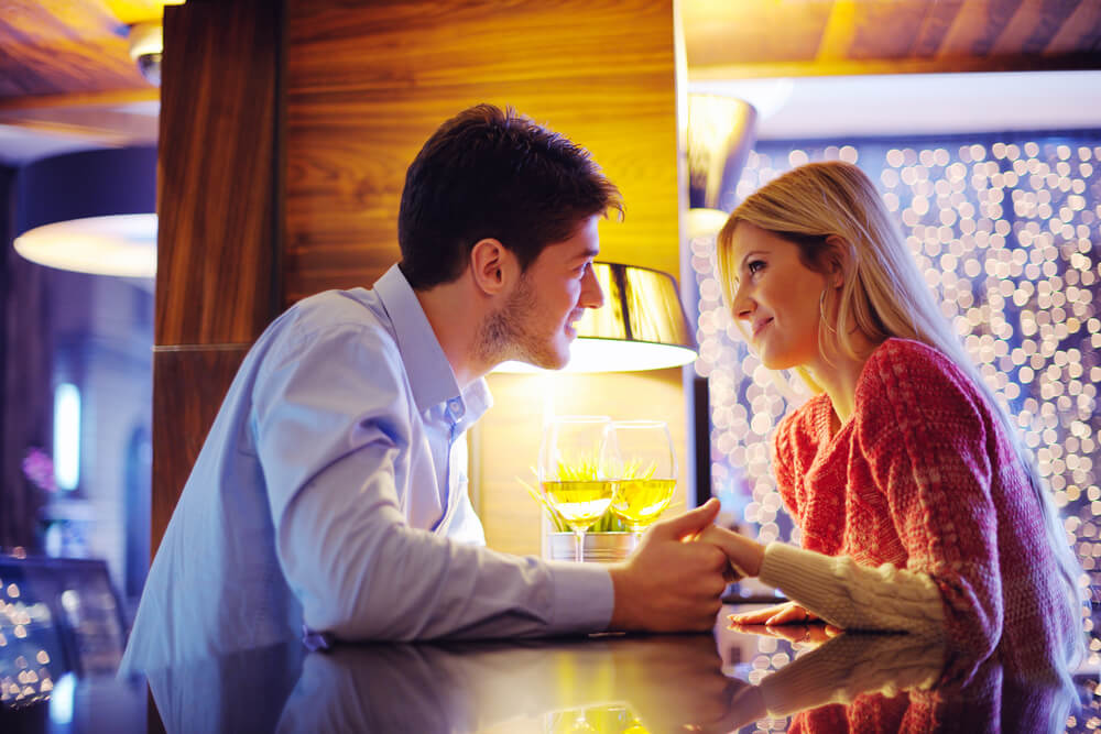 Couple enjoying a candlelit romantic moment