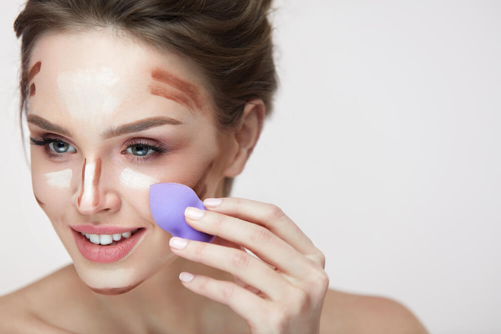 Blending in makeup with a blending sponge