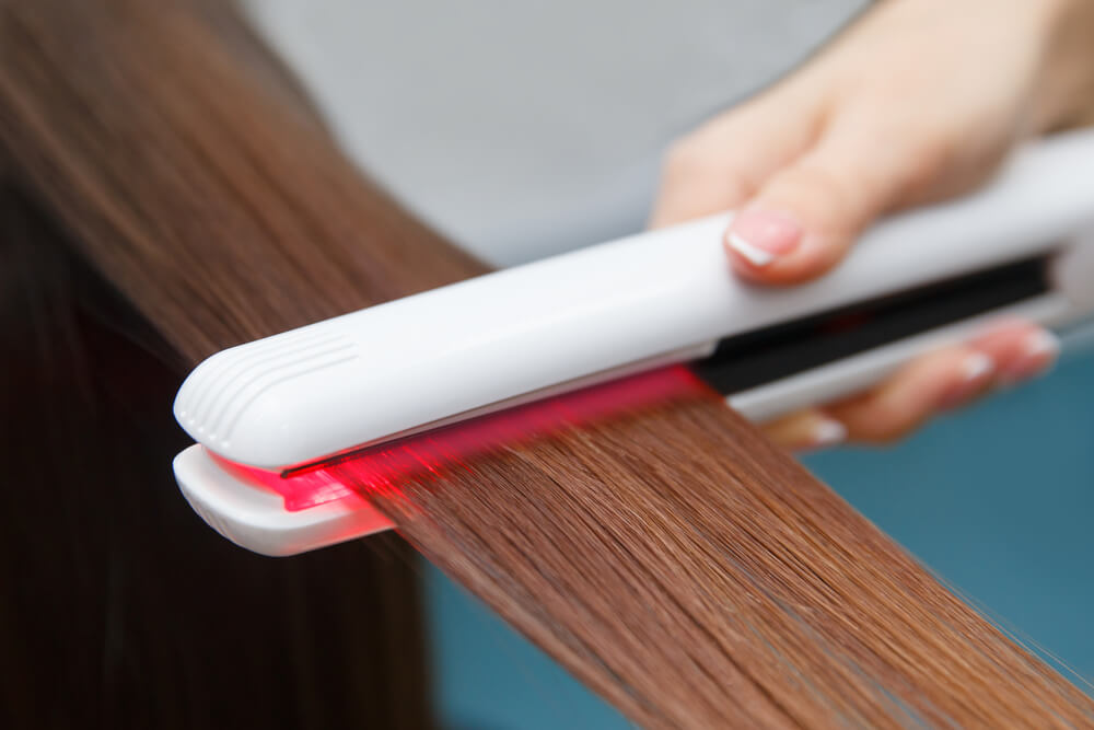 Using hair straightener with red LED light