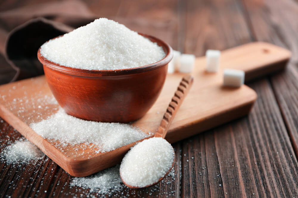 Sugar in bowl and spoon