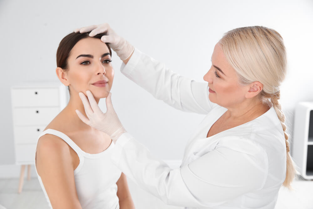 Woman at dermatologist consultation