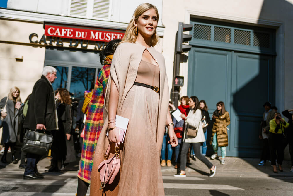 Woman in beige outfit