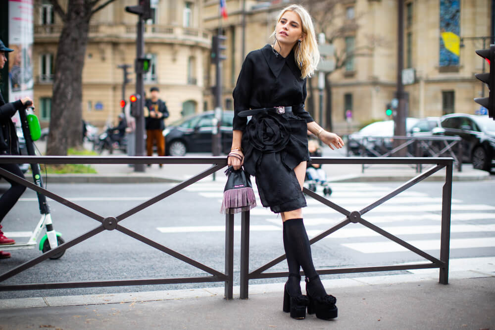 Woman in black outfit