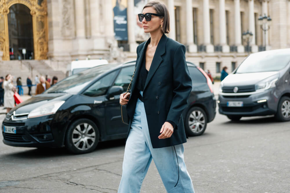 Woman in jeans and blazer