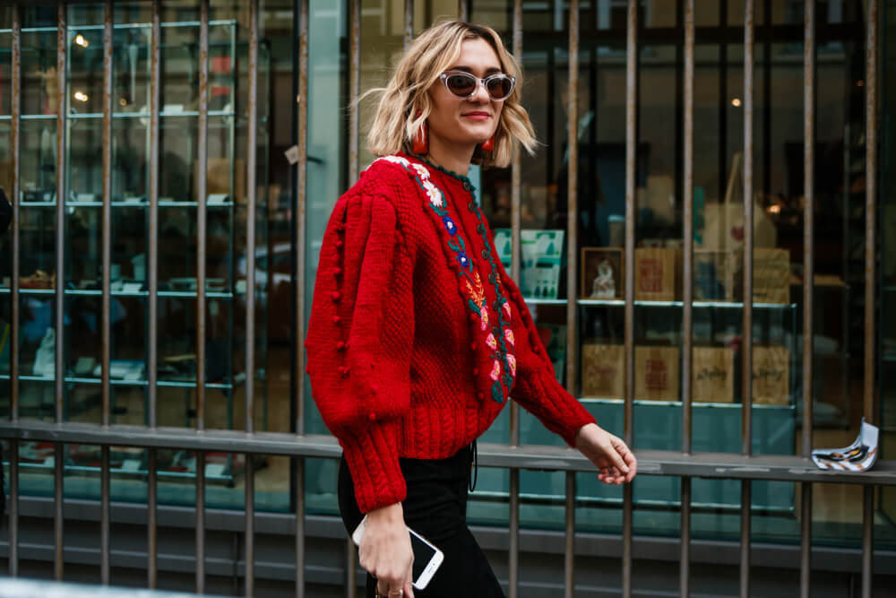 Woman in red sweater