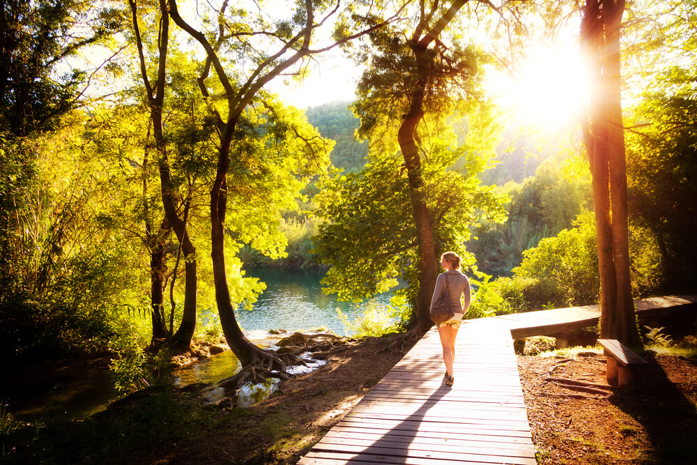 Woman walking in woods