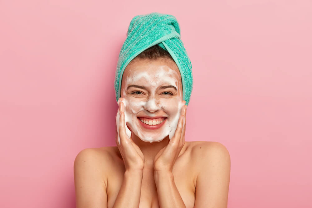 woman washing face