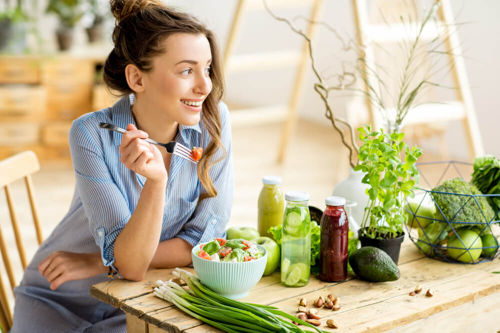 woman eating salad