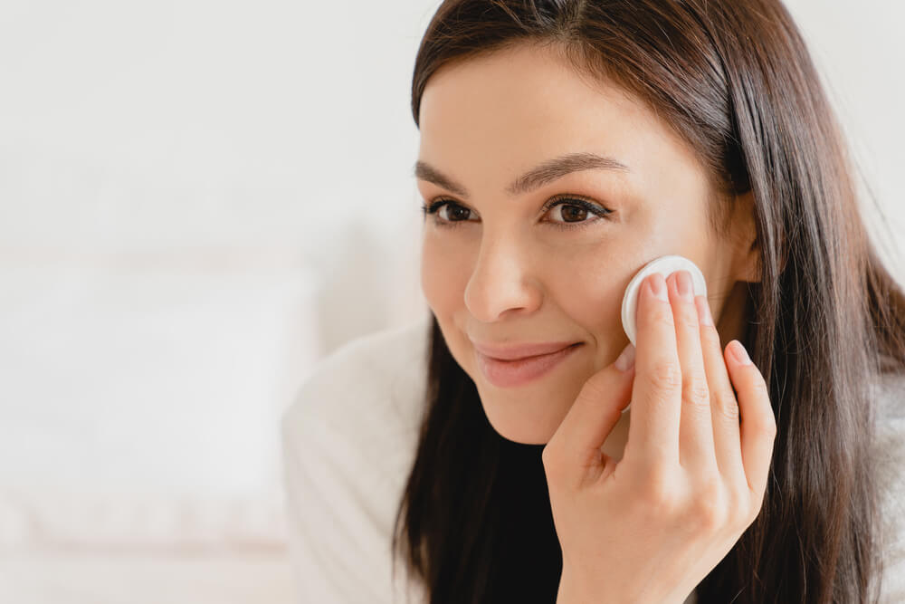 woman exfoliating