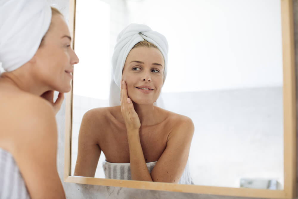 woman applying skincare