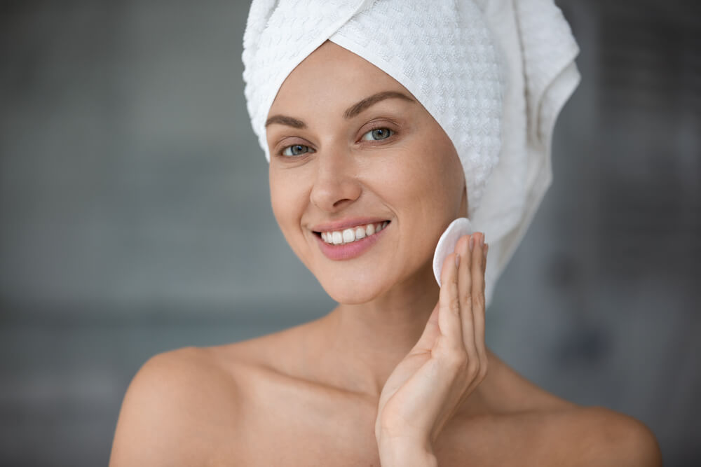 woman applying toner