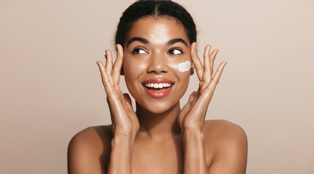 woman applying skincare