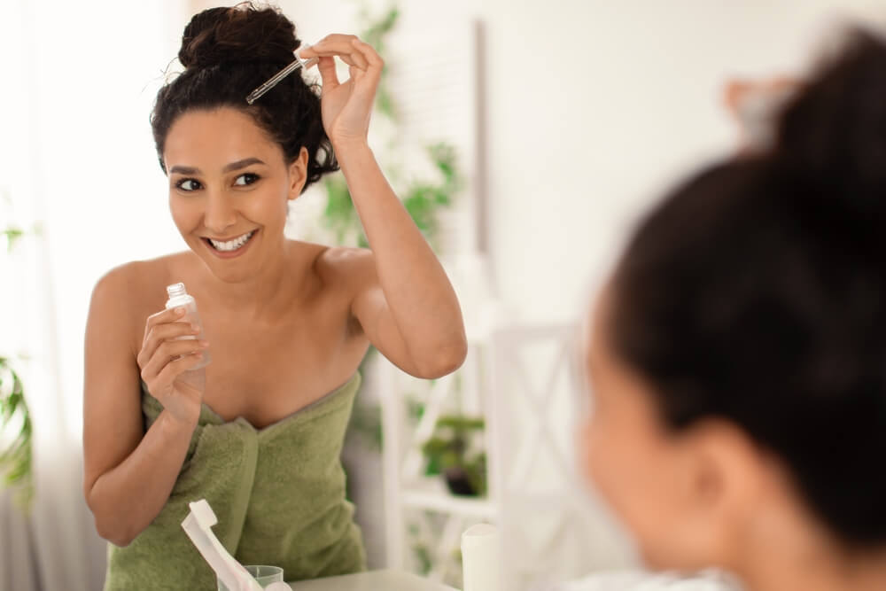 woman hair serum