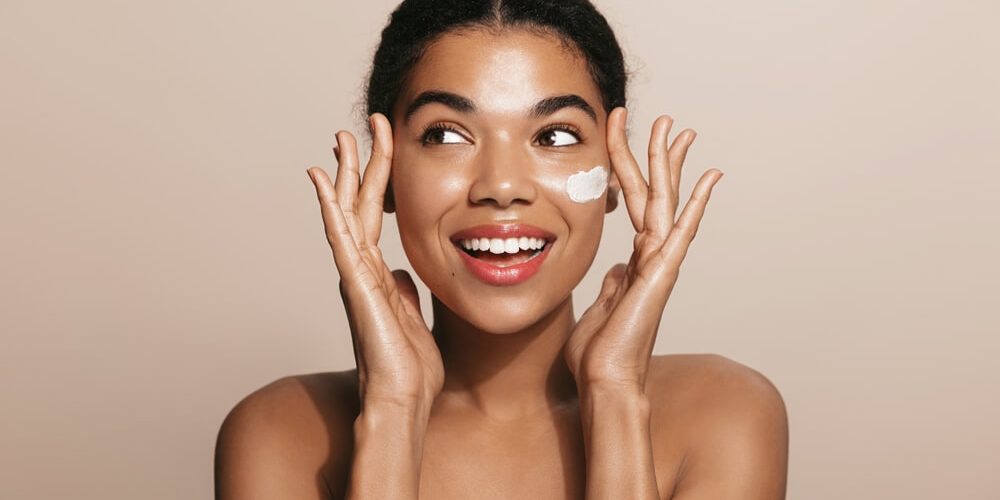 woman applying skincare