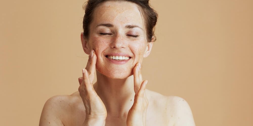 woman touching skin