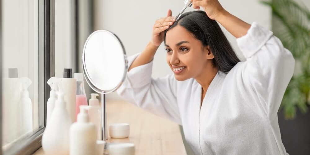 applying scalp serum